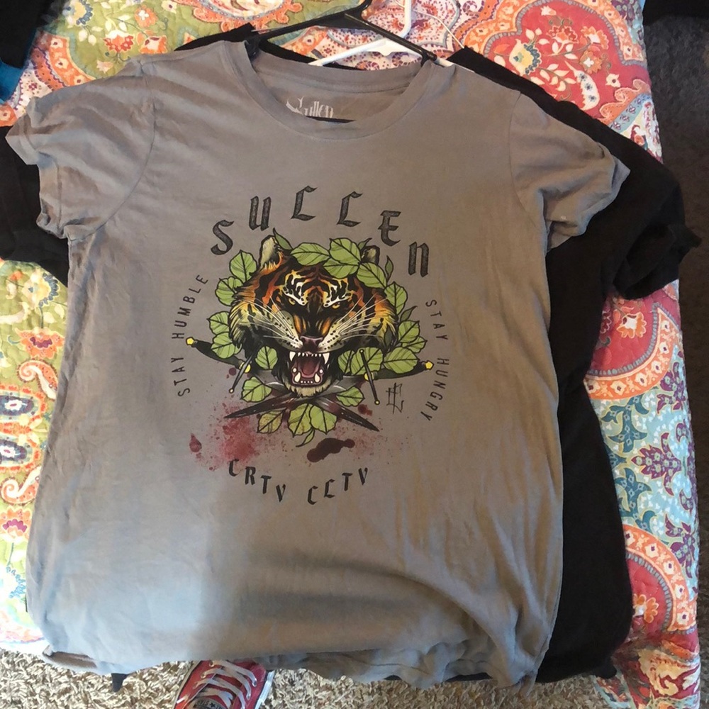 Woman’s sullen art T-shirt